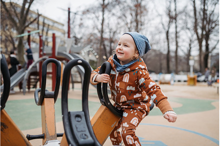 Cute toddler girl playing outdoor in, a Nature Photo by HalfPoint