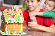 children decorate gingerbread house, a Holiday Photo by EvgeniiAnd (Thumbnail 2 of 2)
