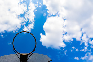 Low angle view of a weathered basketball hoop with no net, frame, a Sports & Recreation Photo by Ales Munt
