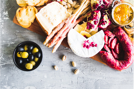 Assortment of tasty appetizers or, a Food & Drink Photo by NelliKovalchuk