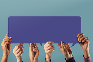 Group of hands holding colorful Speech Bubble together. Concept, a Photo by salmon.black