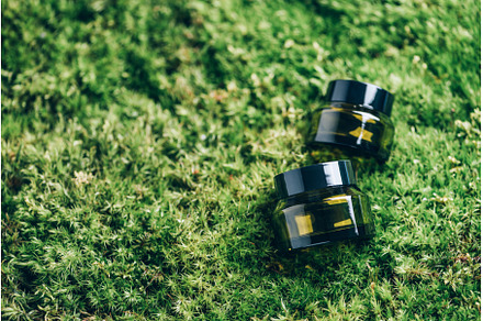 Green glass bottle containers for, a Beauty & Fashion Photo by Enjoy Photo