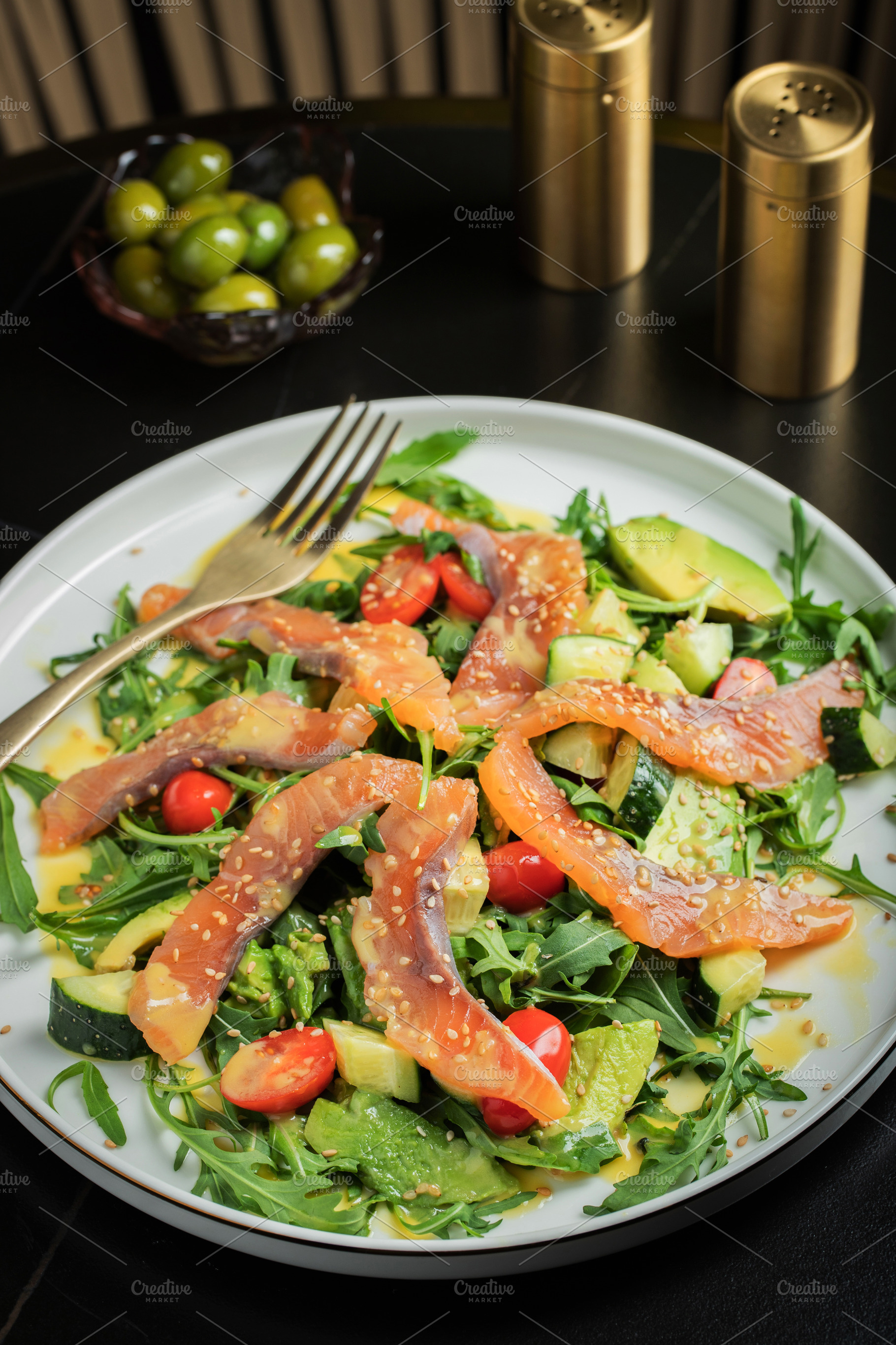 Salad with salted salmon and arugula, a Food & Drink Photo by Budarinphoto