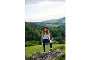 Young tourist woman traveller with, a Person Photo by HalfPoint