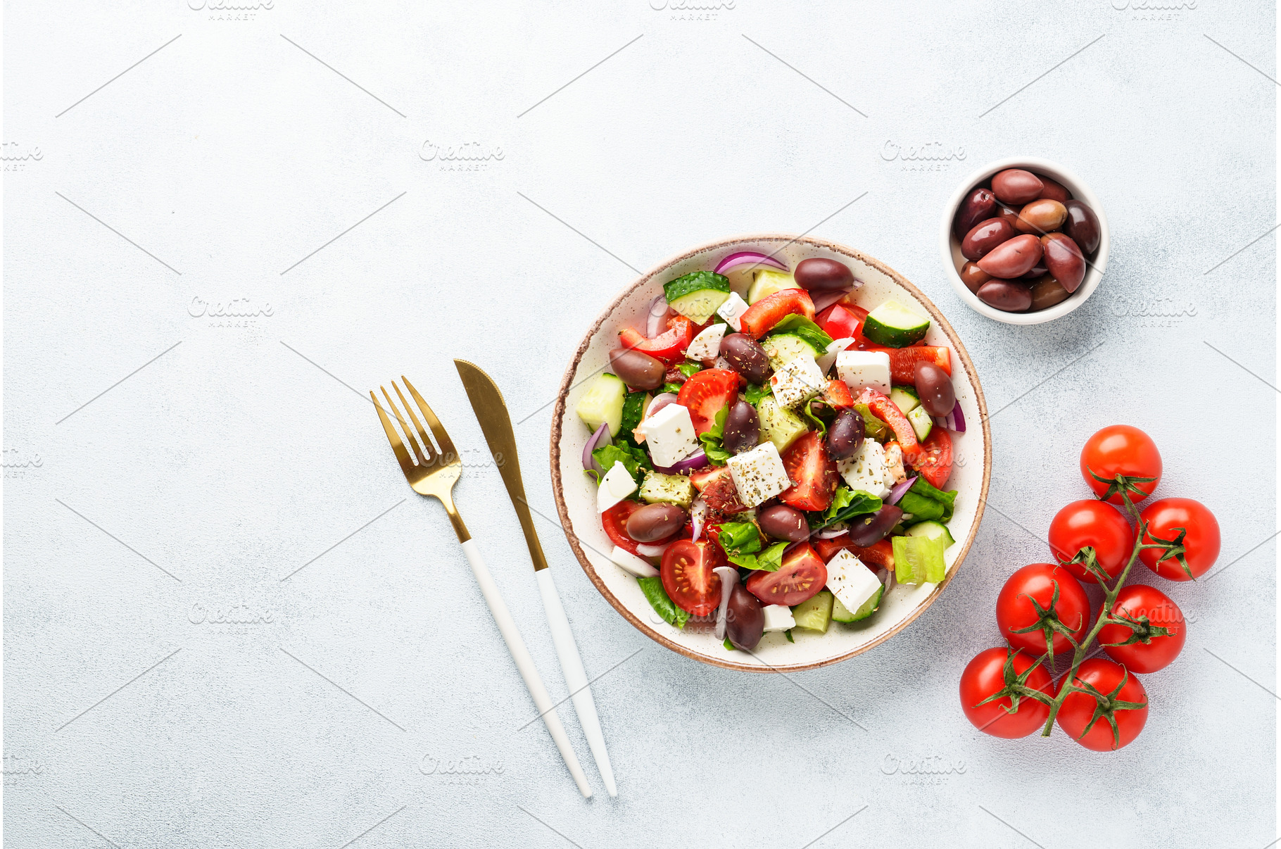 Greek salad in craft plate on white, a Food & Drink Photo by Nadia-nb