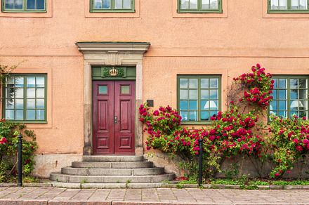 The  facade of a peach stone house, an Architecture Photo by StripedNadin