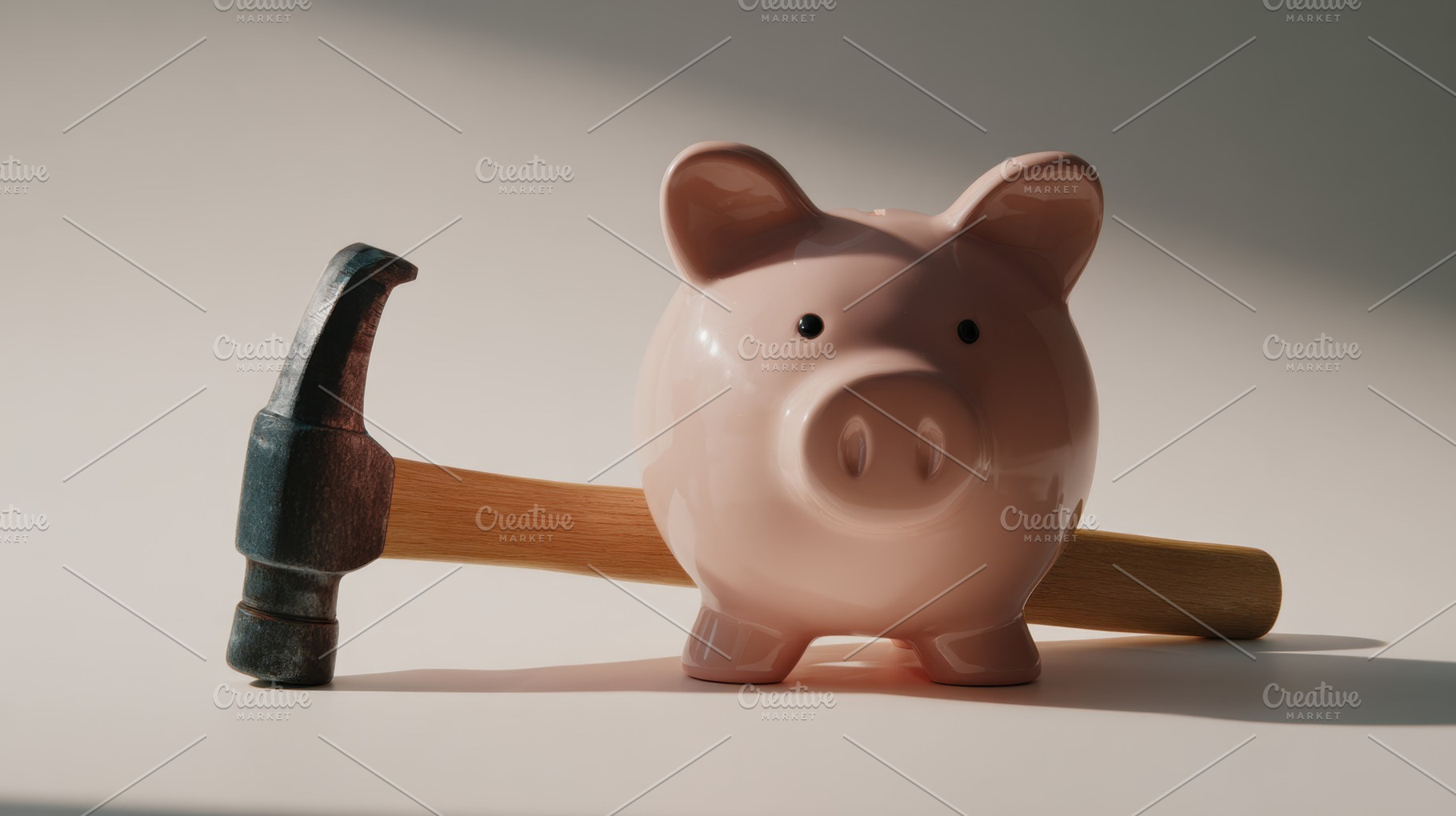 Piggy bank and hammer on table, a Photo by Beautiful things