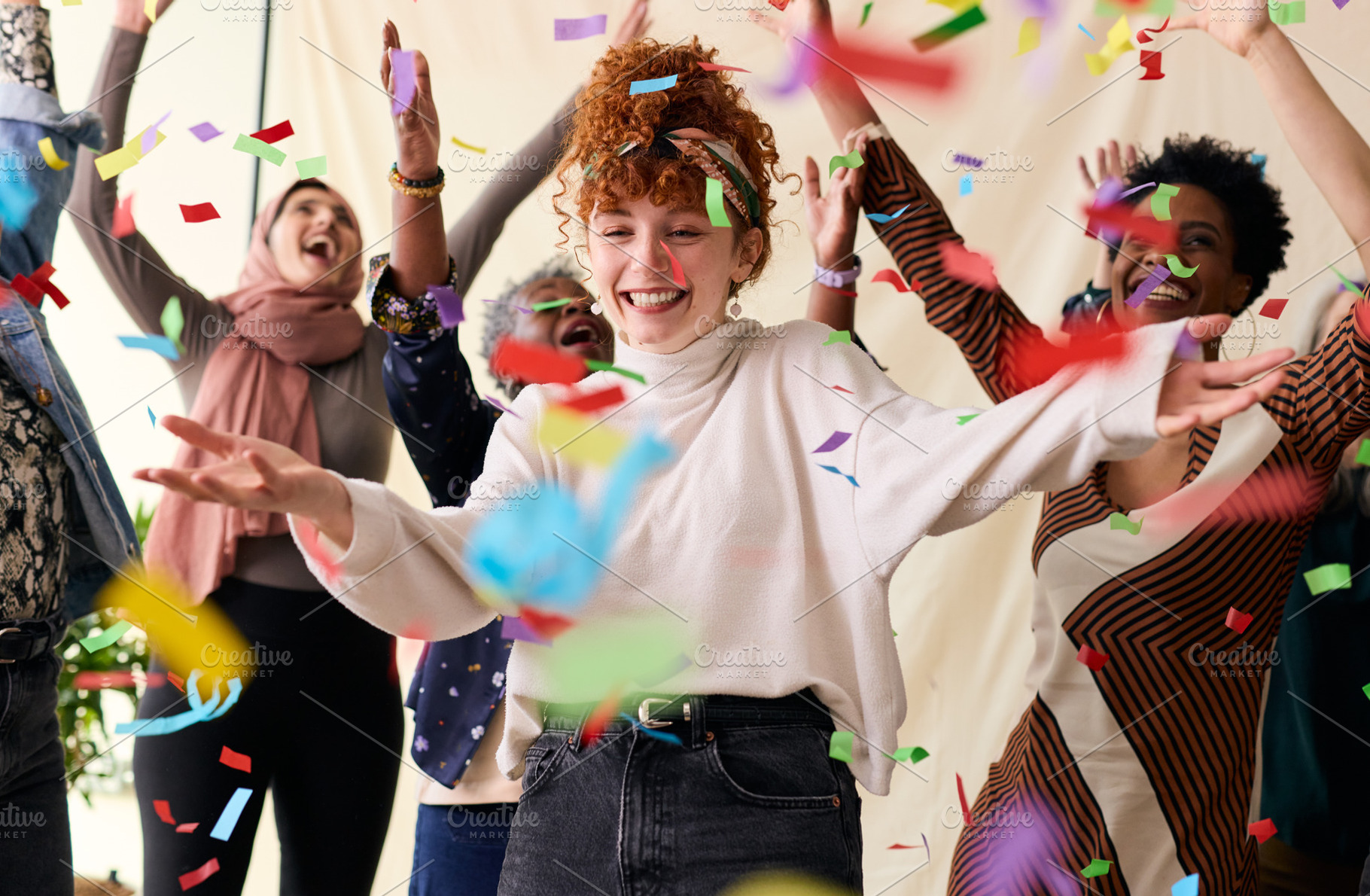 Action shot of young white woman celebrating International Women's Day with fri, a Technology Photo by Southworks