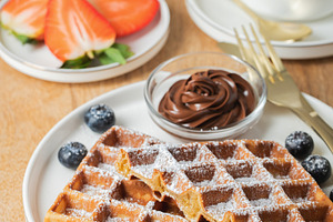 Belgium waffles Homemade waffles with strawberries, a Food & Drink Photo by Budarinphoto