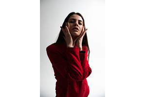 Young adult woman with dark hair, a Person Photo by volodymyrshtun13795