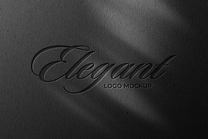 Debossed Black Paper Logo Mockup, a Mockup by Design Squad