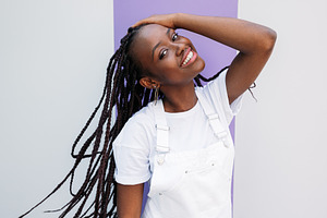 Happy girl in white overall, a Person Photo by Artem Varnitsin