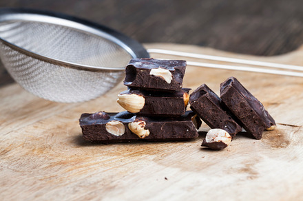 chocolate with whole nuts, a Background Photo by MyPhotos