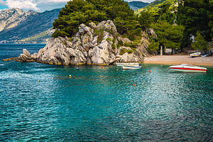 Moored motorboats in the small bay, a Nature Photo by Alpine Dreams
