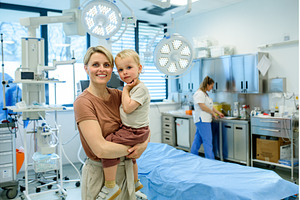 Portrait of beautiful mother with, a Health & Medical Photo by HalfPoint