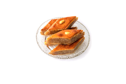 Oriental sweet baklava isolate on a, a Food & Drink Photo by yanadjana