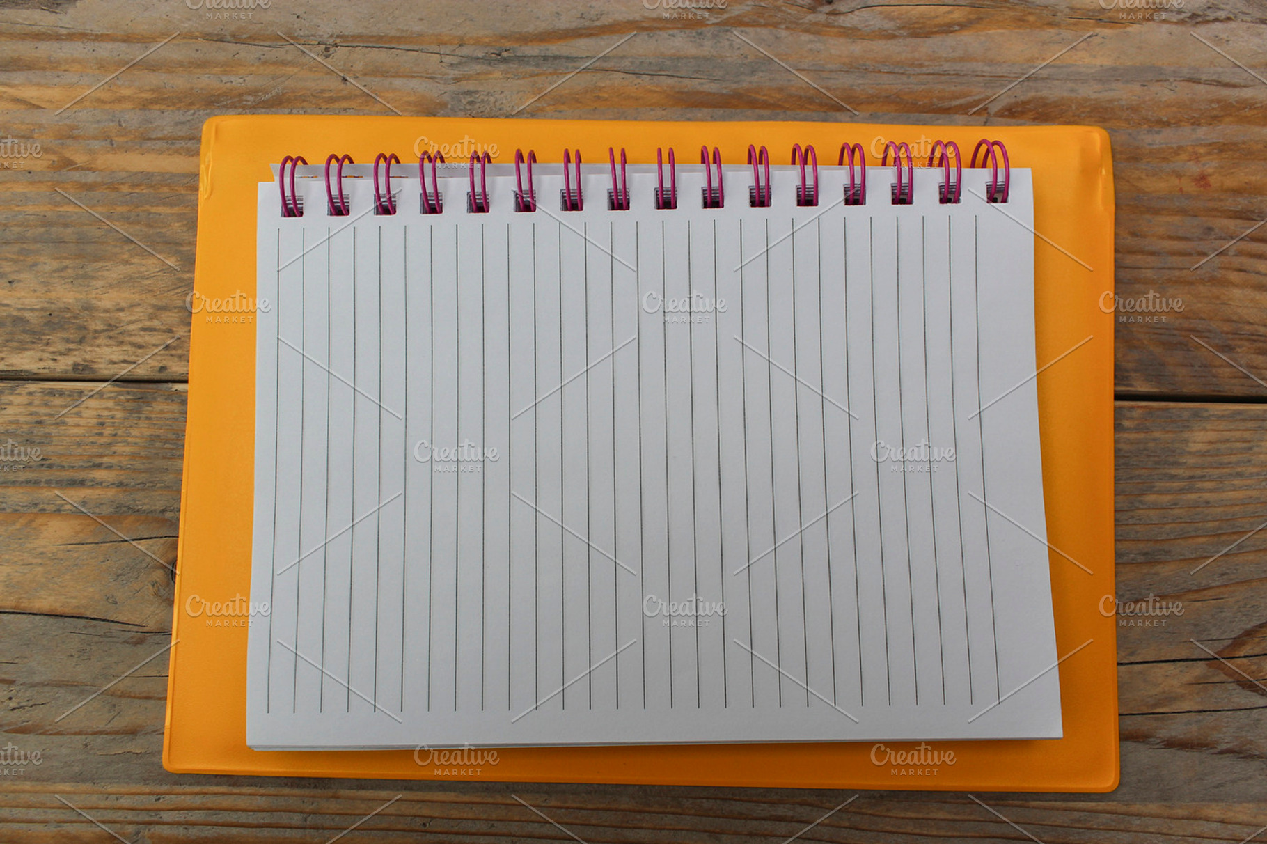 Notebook containing notebook, note book, and paper