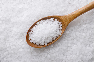 Salt in a wooden spoon background, a Food & Drink Photo by innakreativ