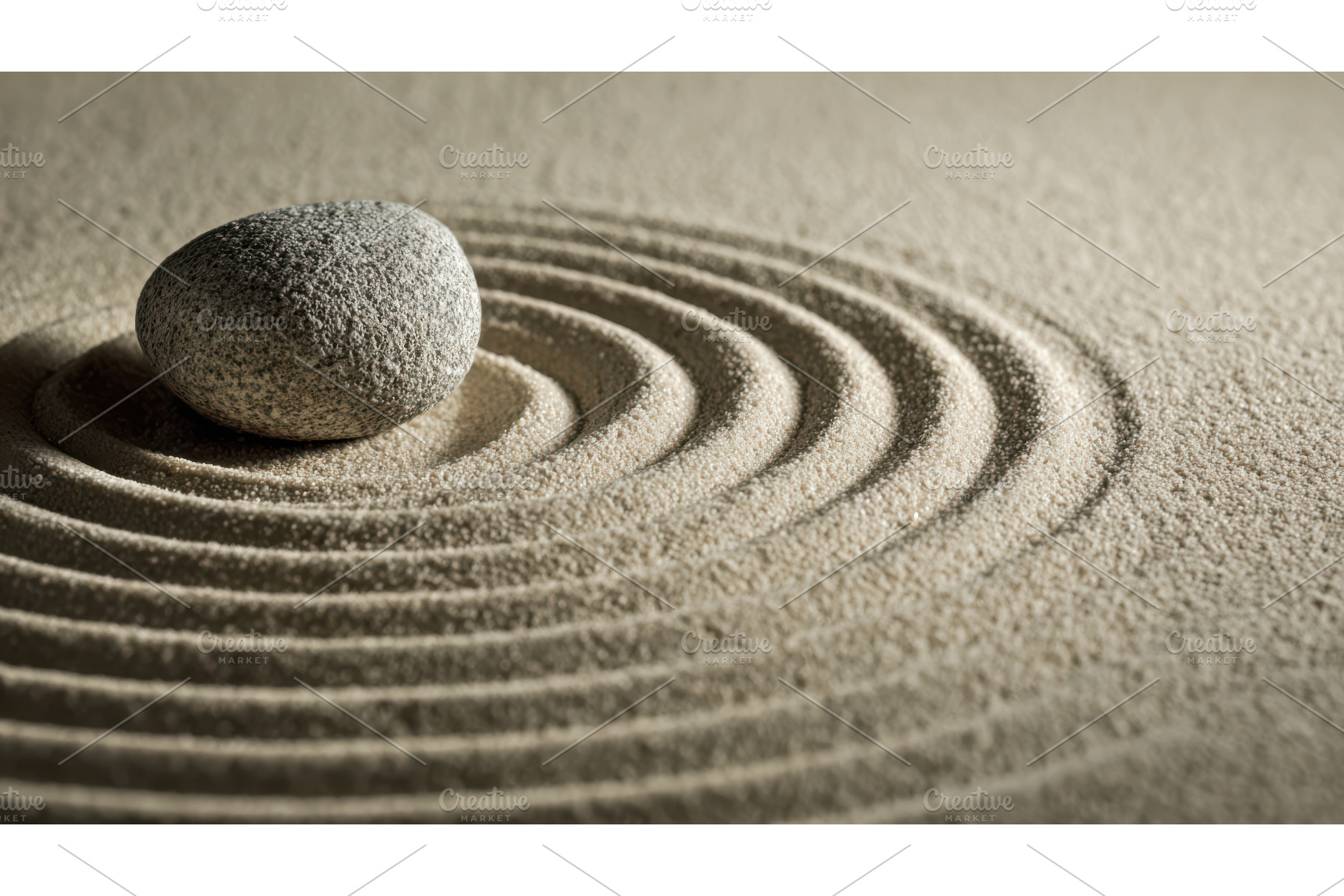Single stone sits in the center of, an Abstract Photo by Lermont51