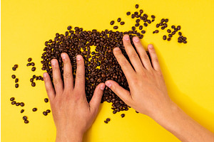 Coffee Beans On A Yellow Background