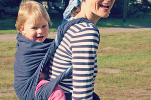Carrying baby, a Person Photo by BOOCYS