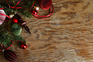 Christmas border. Festive side border of paper ornaments, glass