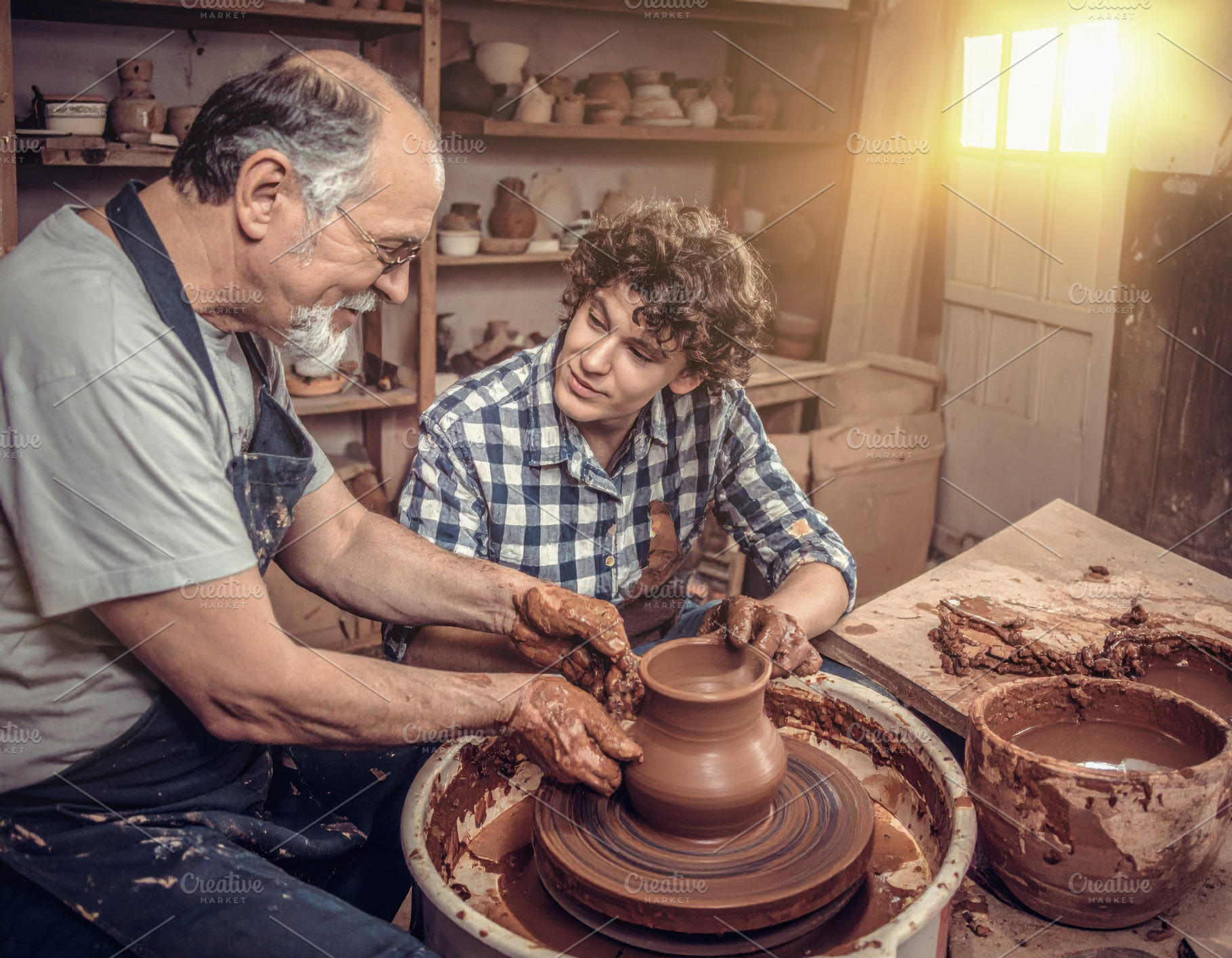 Master Teaching Pottery on Spinning Wheel, an Arts & Entertainment Photo by Davizro's Market