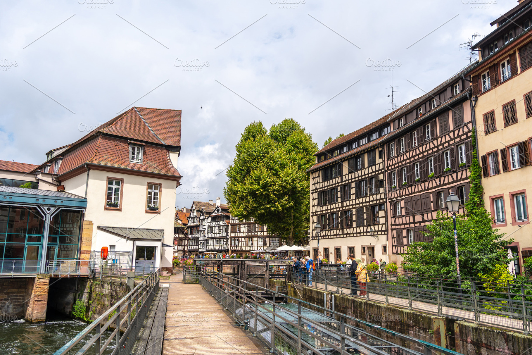 Walkway and half-timbered houses in Petite France Strasbourg, an Architecture Photo by GoodGoods