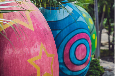 Multicolored eggs in the grass, a Holiday Photo by Elizaveta Galitskaya