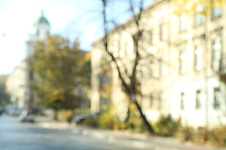 Blurred photo of city in sunny autumn day, a Holiday Photo by AtlasStudio