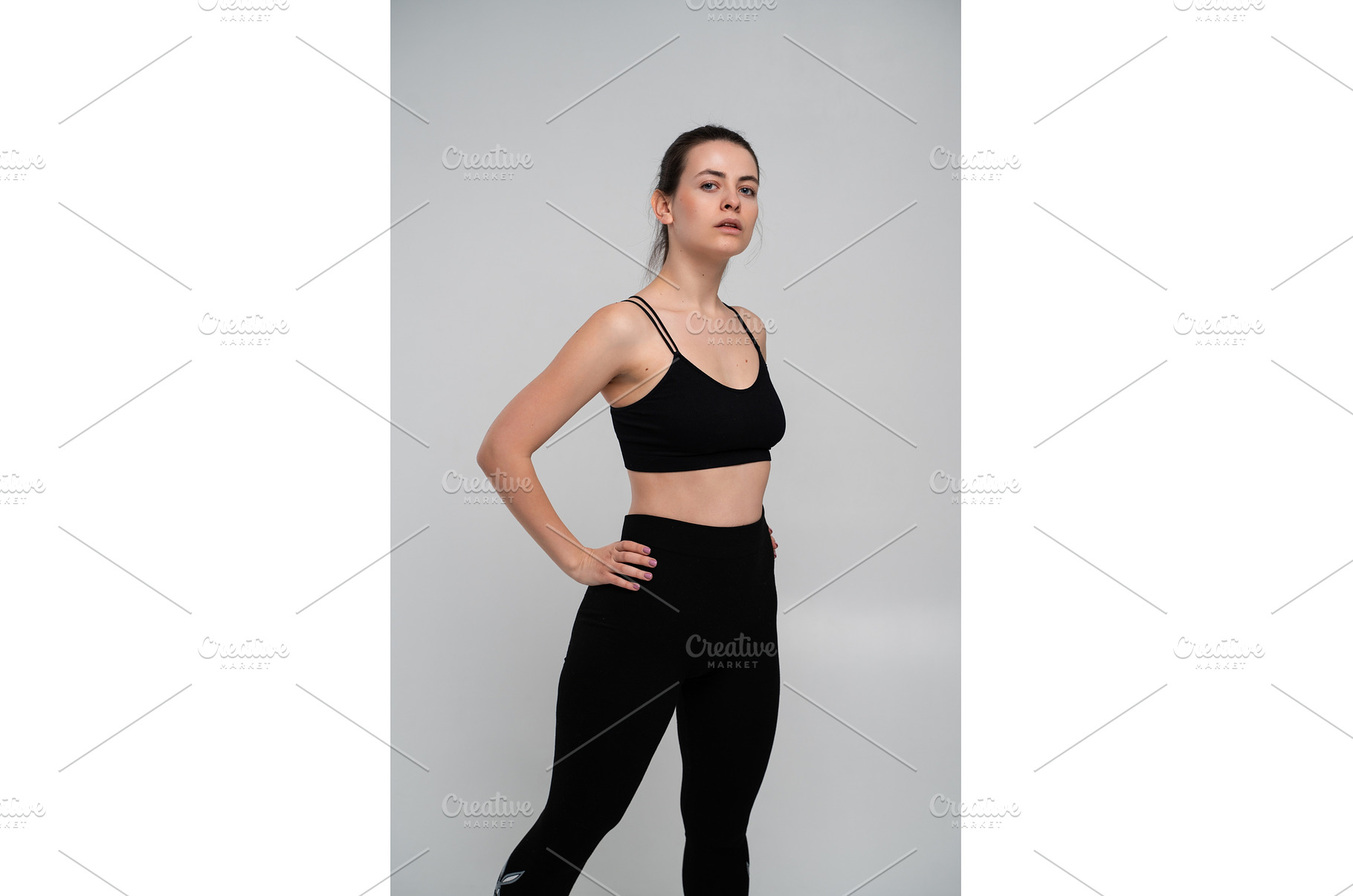Young woman standing confidently in, a Sports & Recreation Photo by volodymyrshtun13795