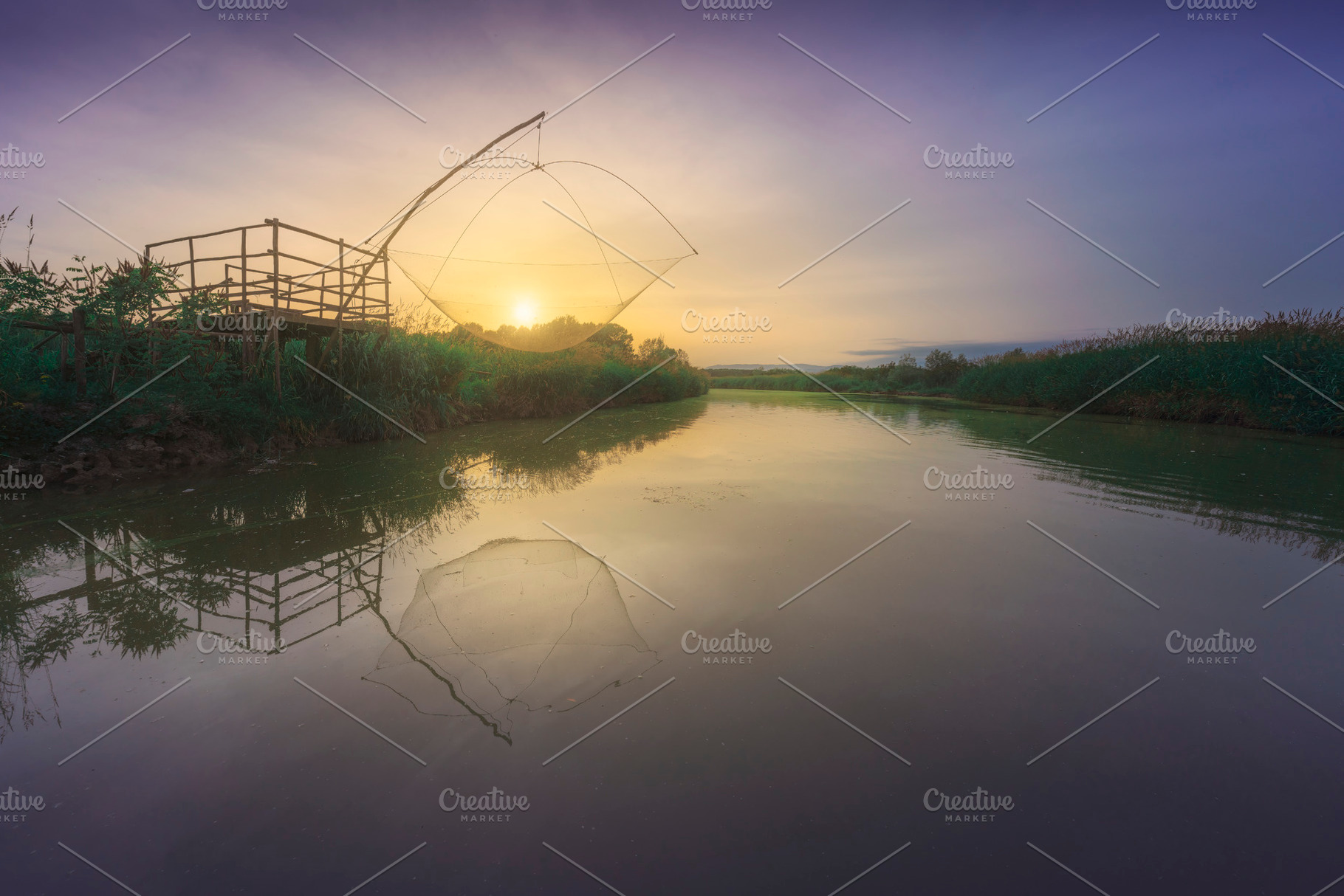 Platform with fishing net at sunset, a Nature Photo by Stefano Orazzini