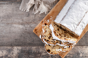 Traditional Christmas Stollen with Raisins and Powdered Sugar on christmas, a Food & Drink Photo by etorres69