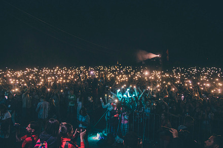 Concert crowd lights up phones