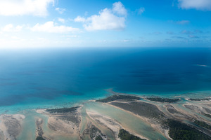 Aerial view of a motu in Tikehau Atoll, French Polynesia, a Nature Photo by GoodGoods