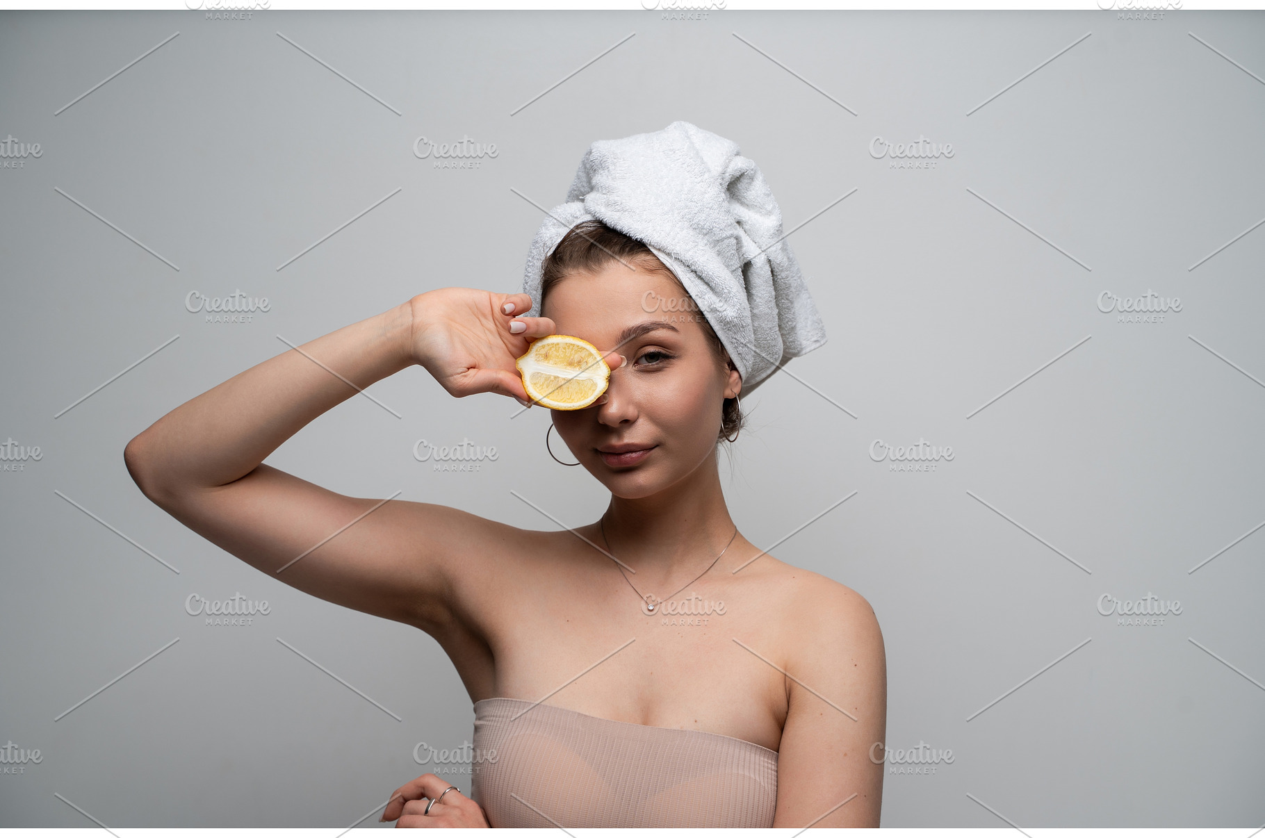 Woman with hair wrapped in towel, a Person Photo by volodymyrshtun13795