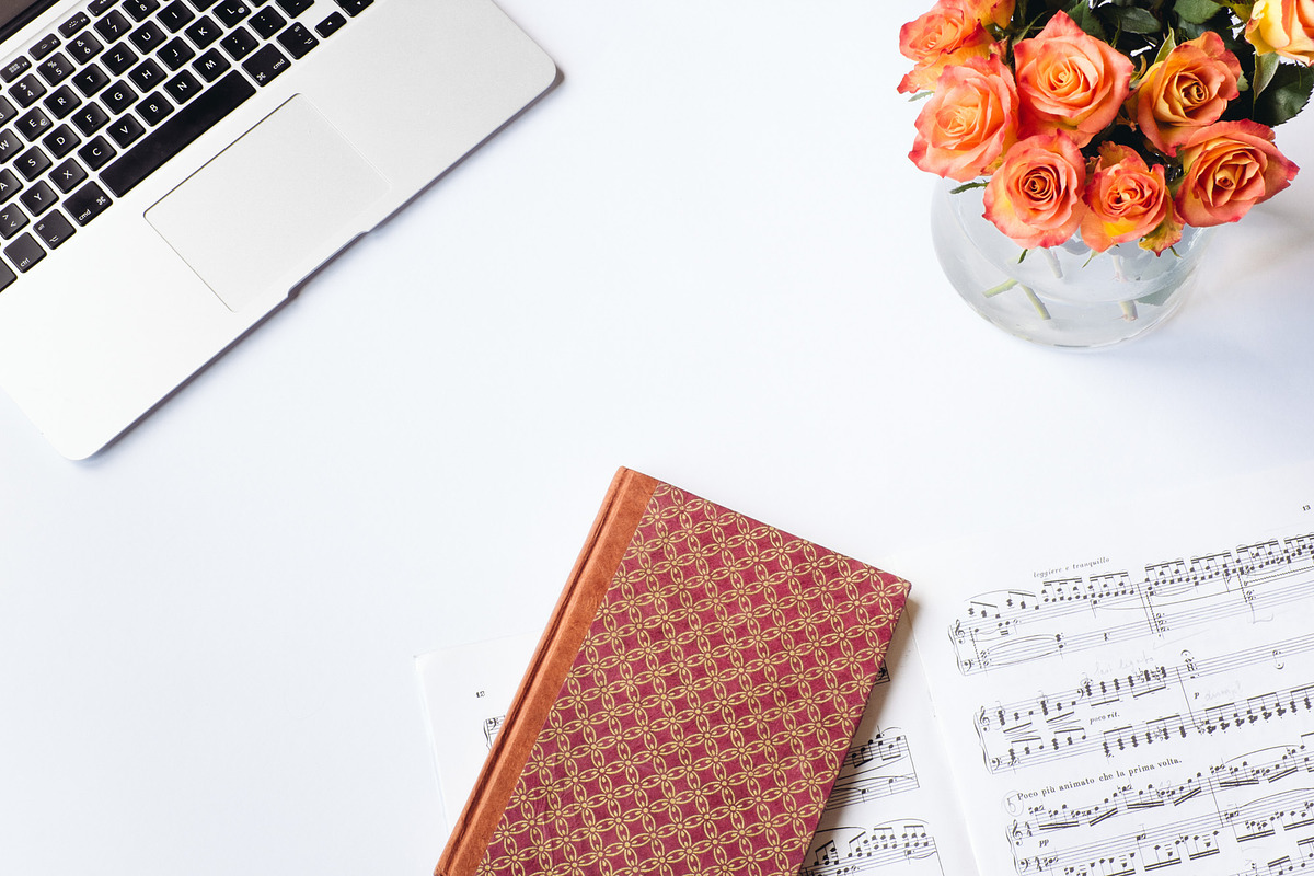 Book, flowers and sheet music, an iPad Mockup by Barn Images