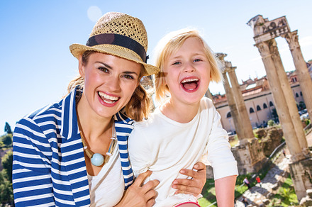 Smiling mother and daughter tourists stock photo containing ancient and, a Person Photo by Alliance Images