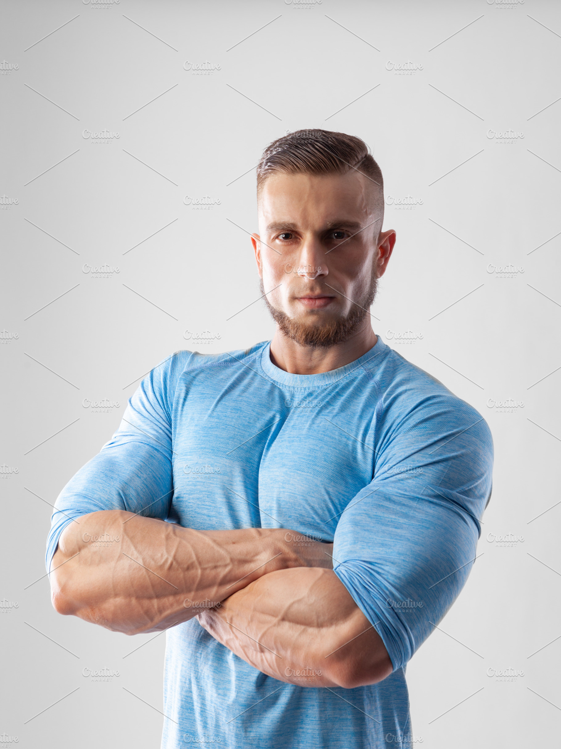 Portrait of a muscular male model on containing male, young, and model, a Sports & Recreation Photo by sport&beauty stock photo