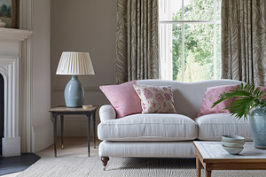 Cozy living room interior design featuring a comfortable sofa, fireplace, elega, an Architecture Photo by Studio ANNA