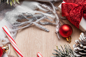 Christmas gifts and candy cane on cozy shawl, a Holiday Photo by Olena Rudo