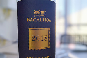 Bacalhoa moscatel de setubal wine bottle on dining table, a Food & Drink Photo by DanFLCreativo