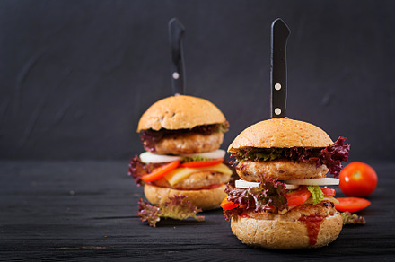 Big hamburger featuring onion, meal, and breast
