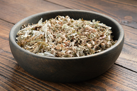 Bowl of dried Iceland moss for making healthy herbal cough tea.