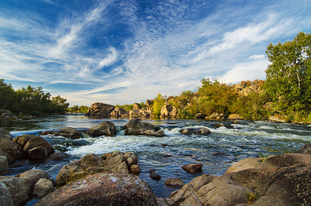 Mountain stream containing water, waterfall, and mountain, a Nature Photo by Nature and travel