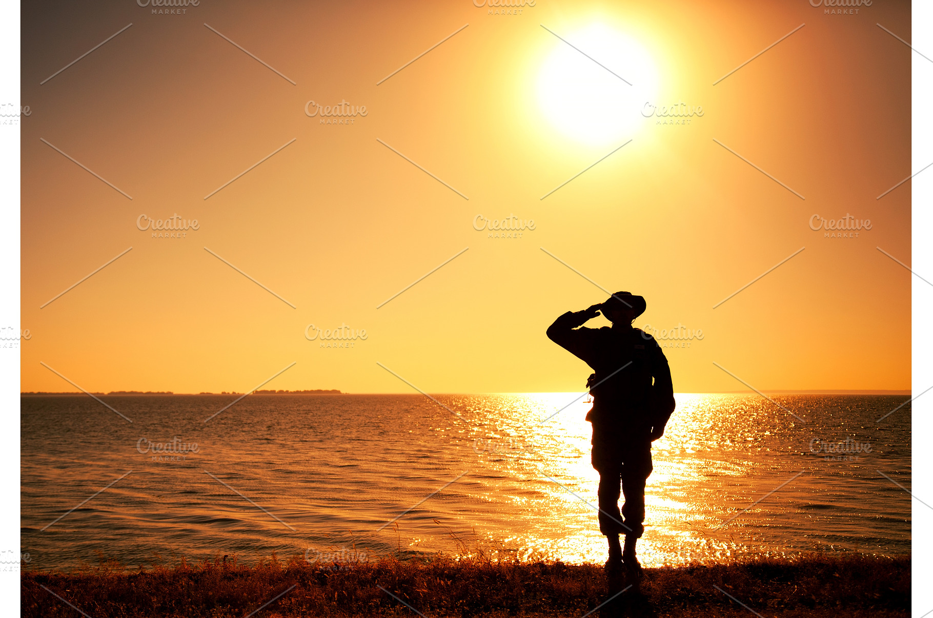 Silhouette of saluting on shore, a Nature Photo by Getmilitaryphotos