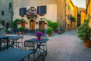 Cozy street cafe at early morning, an Architecture Photo by Alpine Dreams