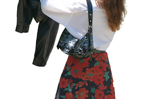 Young woman photographing with jacket in hand isolated photo, a Person Photo by DanFLCreativo