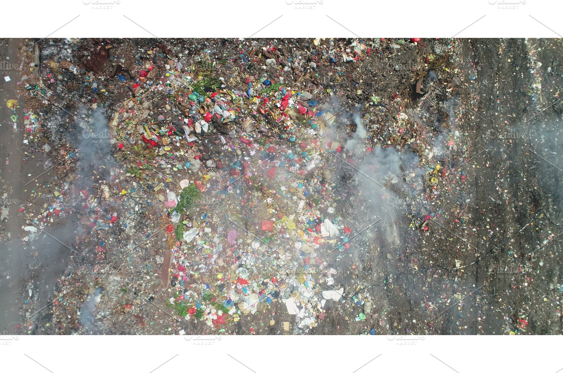 Smoke rising from burning garbage, an Industrial Photo by Goinyk