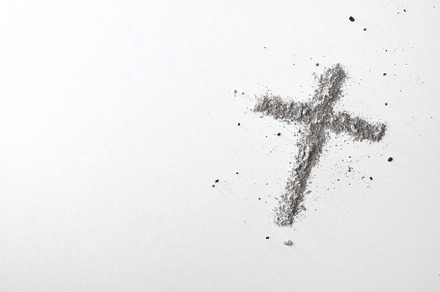 Cross made with ashes on white table top view, a School & Education Photo by Davizro's Market